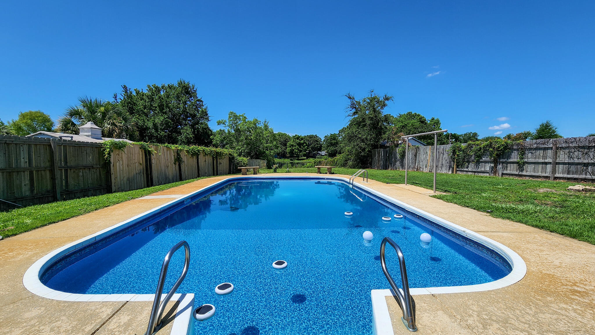 Charming Brick Home with Private Pool, Lake Views & Modern Upgrades!Welcome to this beautifully maintained 3-bedroom, 2-bath brick home in the heart of Mary Esther, offering the perfect blend of comfort, style, and Florida charm. Situated on a serene lakefront lot, this home features its own private pool and spacious backyard oasis - perfect for relaxing or entertaining.Step inside to a bright and open floor plan highlighted by skylights that flood the living area with natural light. To your right, a versatile flex space offers the ideal spot for a home office, playroom, or reading nook. To the left, the inviting living room flows into a cozy dining area, complete with a fireplace that adds warmth and character. The kitchen is thoughtfully designed with a breakfast bar for casual dining and entertaining, located conveniently next to the dining space. Outside, enjoy a covered front porch, and in the backyard, a covered patio overlooking the pool and peaceful lake views - your own private retreat! Notable upgrades include new roof (2024), HVAC (2017), water heater (2019), & an updated pool liner. Don't miss this opportunity to own a move-in ready home with a rare combination of indoor comfort and outdoor enjoyment, all just minutes from local beaches, schools, and Hurlburt Field.