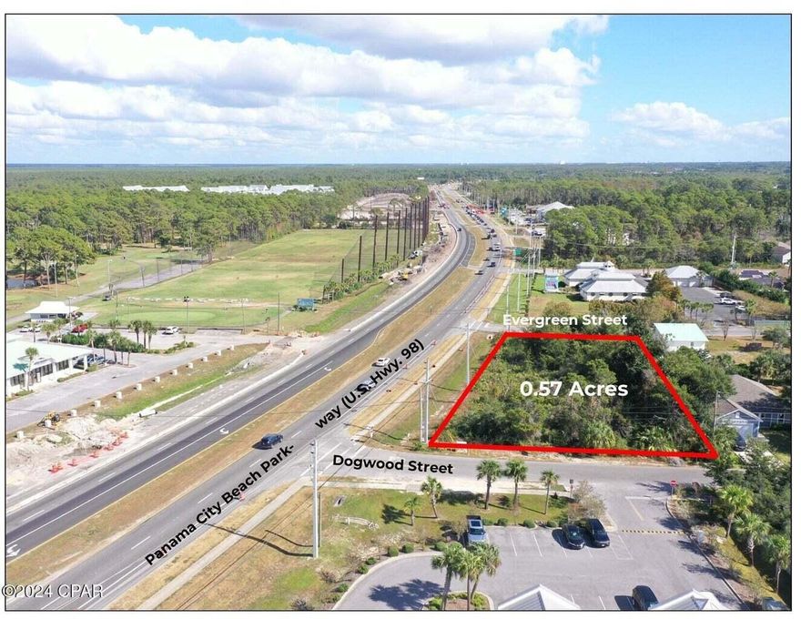 Fantastic commercial lot on Panama City Beach Parkway. The property includes two corners on the south side of the Parkway at Dogwood Street and Evergreen Street. The seller has a Development Order in place to build a 4,426 square foot retail/office building. Central location on the Parkway, south of Legacy Golf (f/k/a Holiday Golf). No wetlands! The average daily traffic count is 52,000! Zoned 'Commercial High Intensity' (CH) within the city limits of Panama City Beach.