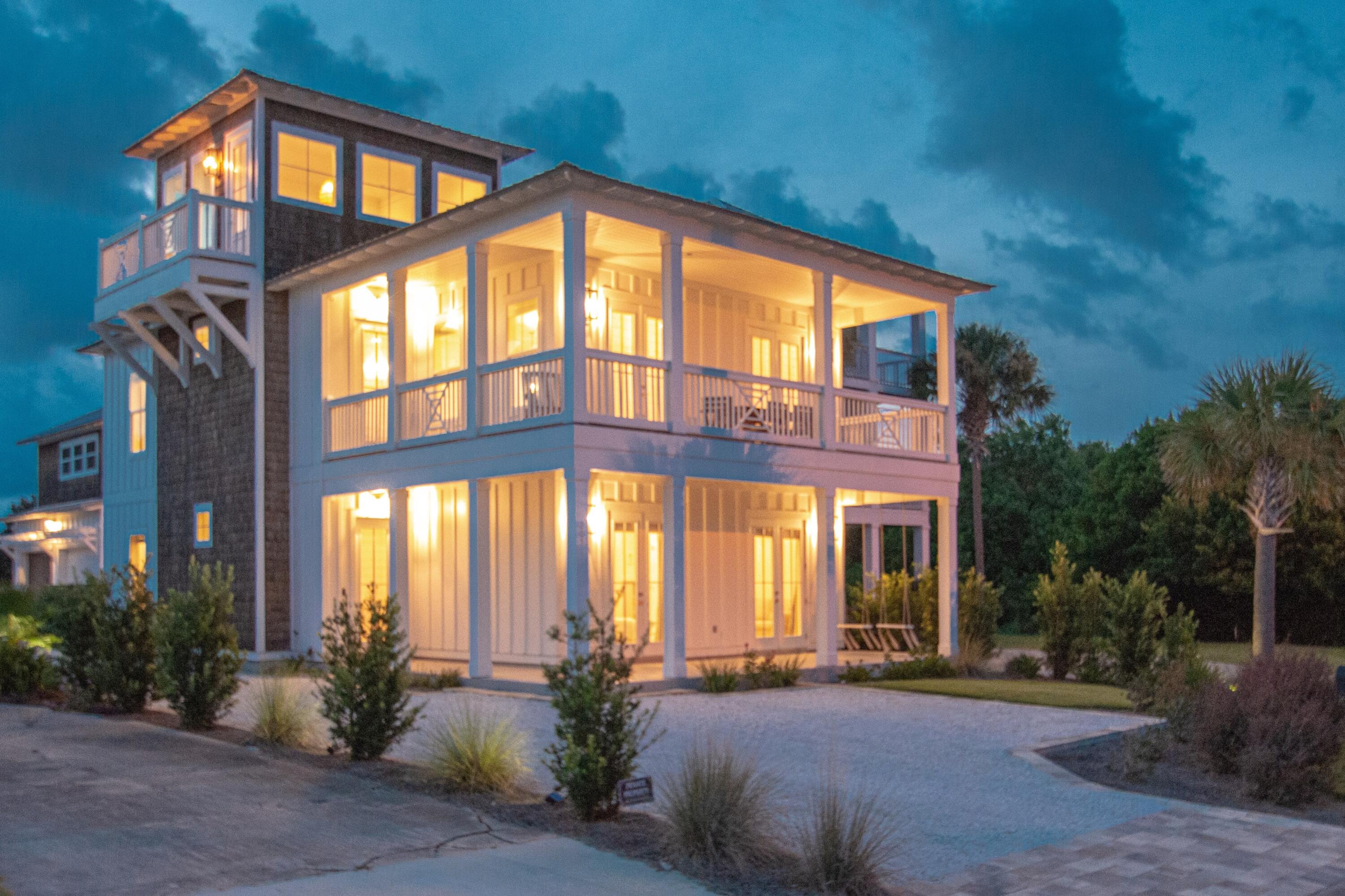 Take advantage of this rare opportunity to own a custom-built, Florida dream home providing ground up Gulf views and 10 acres of never to be built on, dedicated beach in the coveted Gulf front community of Sunnyside on the Gulf! No detail was overlooked in this custom home that is perfectly suited for a high income generating rental property or permanent residence. You will be impressed with every facet of this home from the nearly 800 square feet of shaded porches and balconies, 100% hardie board exterior, professional landscaping, paver lined, bahama rock drive providing parking for 12 to the private courtyard featuring a saltwater, heated pool. This home embodies the Florida Lifestyle! The interior is a luxurious retreat with high end finishes including Cali long board