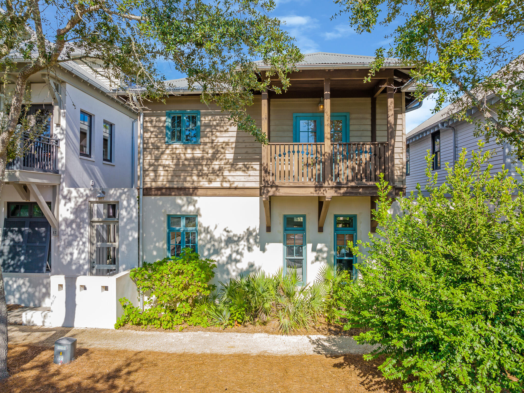 Perfectly poised on 30A in Rosemary Beach, you will find this quintessential beach retreat. This beach home offers 600 square feet of covered porches and a private courtyard to create the most exquisite indoor-outdoor entertaining experience. A short walk to Rosemary Beaches most sought-after amenities, this is an ideal vacation rental or second home. The main floor offers a grand staircase with vaulted ceilings and an open concept with plenty of natural light. The dine-in kitchen is well-equipped with seating for 8 and flows perfectly into the living room that opens to the covered patio and deck. An upper level master suite features a private balcony, walk-in closet and access to the spacious covered deck overlooking the courtyard.