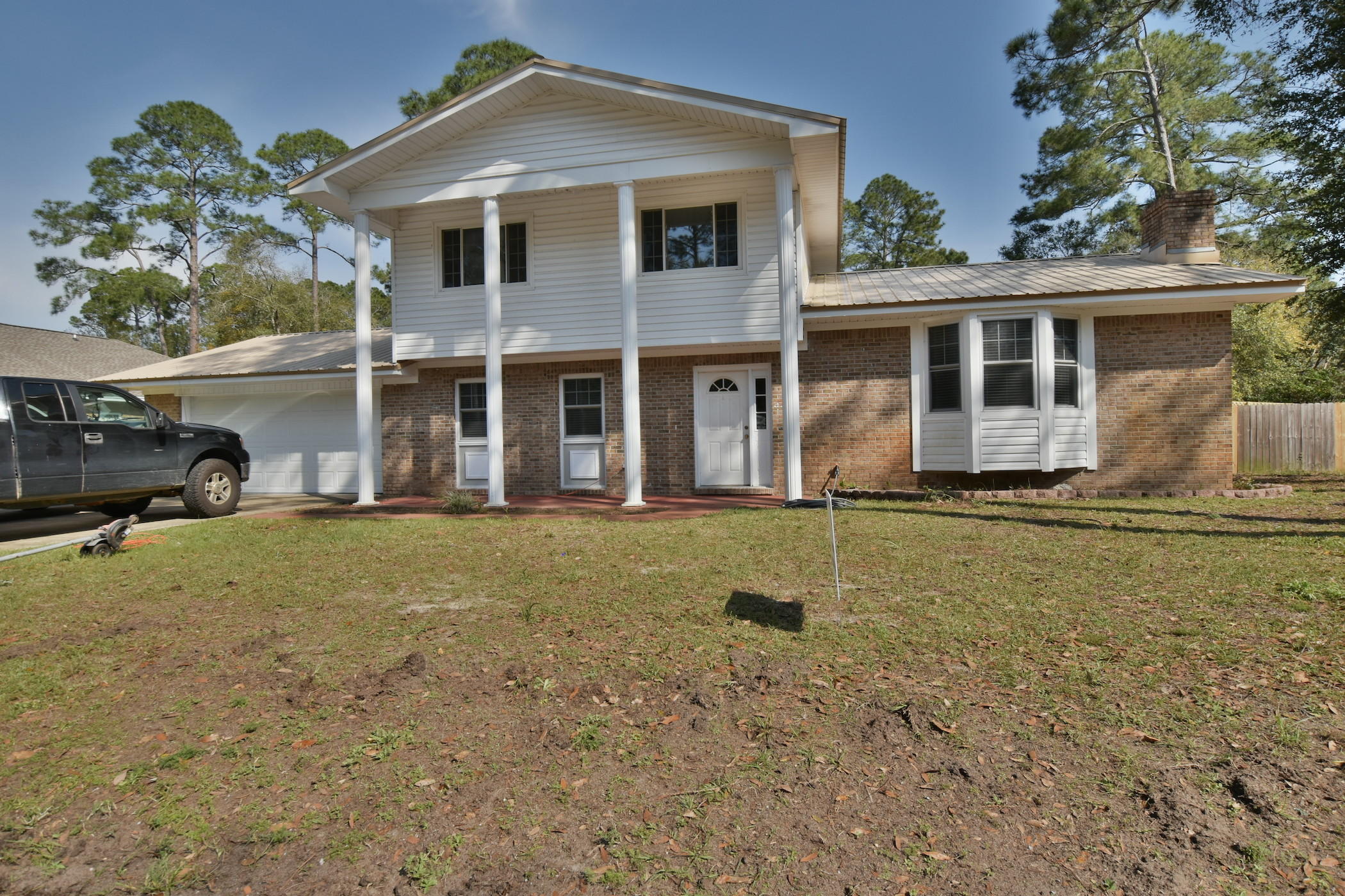 Great home in the heart of Niceville. A block away from the water and estate sized homes. This 4 Bedroom 2.5 Bath home with 2 Living areas, Large Kitchen with new appliances. Tile floors everywhere, carpet in bedrooms. Large Laundry room, privacy fenced backyard with lots of room.