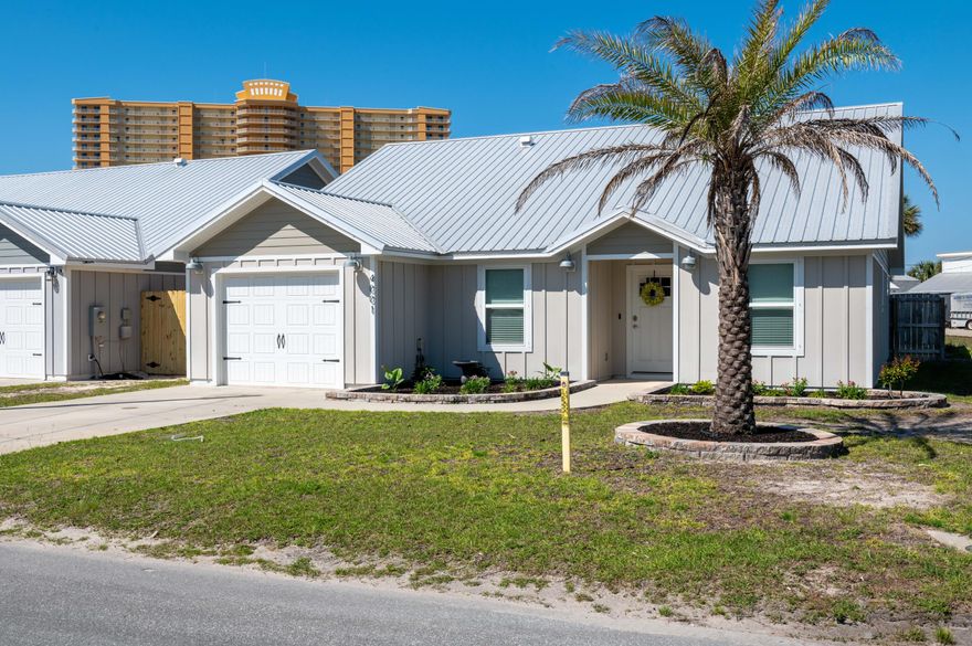 This nearly new Beach home is only 1000ft from Florida's Emerald Coast waters! Perfectly nestled in between some of Panama City Beach's staple restaurants, family fun attractions, bars, shops, & marinas; this home is within a 1/2 mile of three public beach accesses and a short golf cart ride to St Andrews State Park! It features LVP flooring (easy cleanup after beach days and sandy paws) high end appliances, and privacy fenced in backyard complete with pergola. With an open living/dining floor plan, along with three bedrooms and two full baths, this home is situated on a corner lot with plenty of parking and easy access to Thomas Drive. Does it get better? Yes! No HOA, no Flood Insurance required, and the home is on city water and sewer!