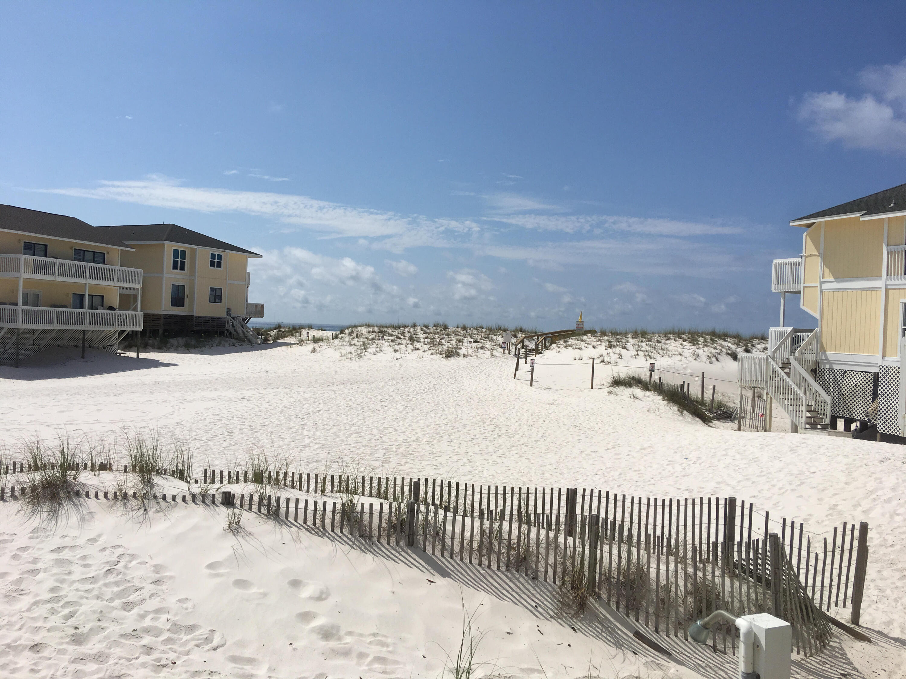 As soon as you leave the deck of this lovely beach condo you will be in the sand. Fully renovated and updated , chic and stylish. Stainless appliances, granite counter tops, and attention to detail. Plenty of room for the whole family and you can also take advantage of vacation rentals. Many great amenities include tennis, executive golf course, onsite restaurant, and there is even a marina. Many fun attractions in the area. Buyer to verify all information.