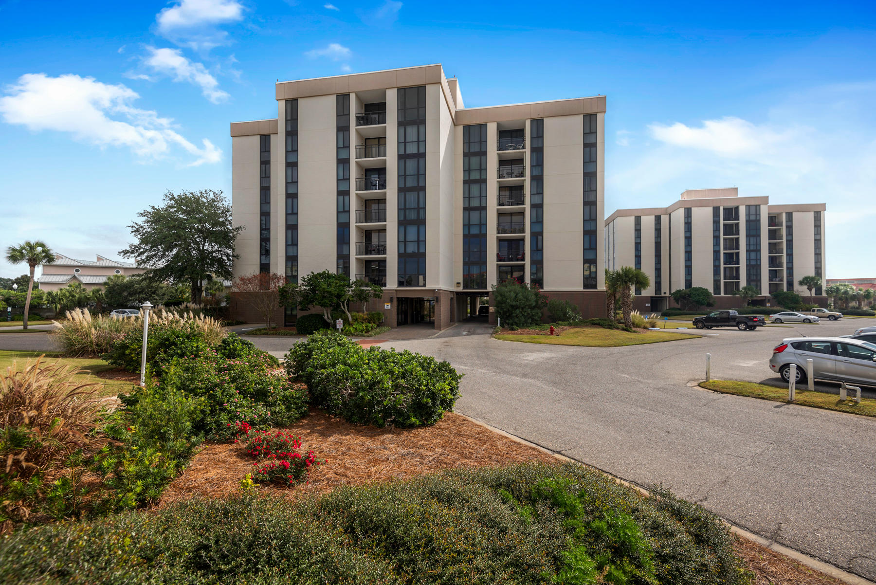 Motivated Seller! This 3 bedroom 2 bath condo in Enclave boasts gulf views from every window in the unit and the balcony! Features include tiled flooring in the foyer, kitchen, living room, dining area and baths, crown molding throughout, stainless steel appliances in the kitchen, washer/dryer hook up and a large exterior storage closet. The master suite offers gulf views, double vanities, a dressing area and walk in closet. Newer sliding glass doors, windows and hurricane shutters on the balcony. Enclave amenities include beach access to the waters edge, community pool which is heated in cooler months, club house, grilling area, tennis courts and sand volleyball. This is a perfect rental unit, second home or even a primary residence. Freshly painted.
