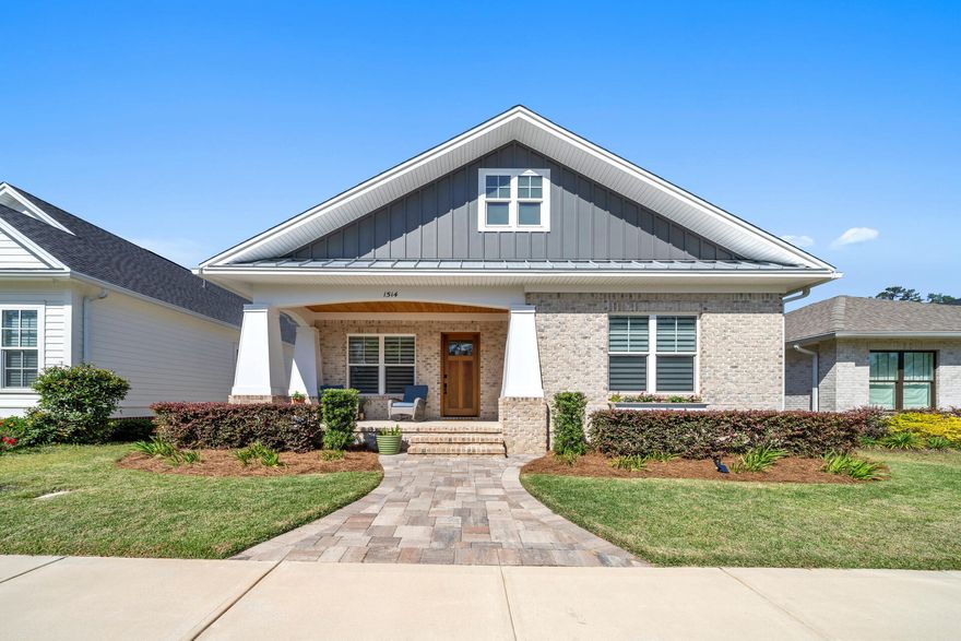 BETTER than new construction home by award winning Ferrin Campbell Construction in Niceville's newest planned community, Deer Moss Creek!! This home is located in the Hartfield area of DMC across the street from a neighborhood park and convenient to the paved trail system that leads to the future pool and community center being built in Phase II. The wide front porch welcomes you into this craftsman style home with a lovely open floorplan. The great room flows seamlessly into the kitchen that is appointed with gorgeous cabinets, quartz counters, stainless appliances and a center island with a breakfast bar. The convenient side door off the kitchen leads to a grilling area as well as a tidy fenced side yard...perfect for pets! This is a split floorplan with 2 bedrooms and a full bath in the front of the house and the master suite in the back. The master bath features a dual sink vanity and a large glass shower. You will LOVE the extra-large laundry room that also leads to the breezy screened porch on the back of the house. The garage in the back of the house on the rear alley has an epoxy floor and handy suspended storage racks. Additional noteworthy features include: custom window treatments, tile throughout the living areas, central vacuum system with a retractable hose, foam insulation, impact glass windows and a gorgeous mahogany front door. NOW is your chance to live in the highly sought after community of Deer Moss Creek...don't miss out!