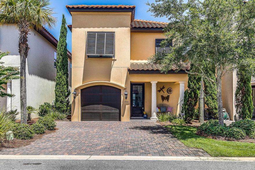 This recently updated  4 bedroom/4 bath Mediterranean home is located in the quaint neighborhood of Villa Lago in Sandestin Golf and Beach Resort.    Features include an open concept living/kitchen area complimented by travertine and hardwood floors. The coastal palette wall colors combined with the rich wood furniture create a transitional theme.  This impeccable home has never been rented but would make a great investment property or second home.   Furnishings and golf cart are included in purchase. Villa Lago amenities include pool and clubhouse and is walking distance to Baytowne Wharf and a golf cart ride away from the shops and entertainment at Grand Blvd.