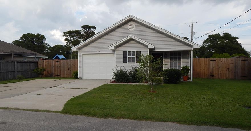 Move-In-Ready! This Lovely 3 Bedroom 2 Bath 1 Car Garage Home has Easy-to-Maintain Vinyl siding! This home has a NEW 14 SEER Rheem HVAC (Heating and Cooling) System ! Affordable Utility Bills! There is tile throughout the Kitchen, Dining Room, Hallway and Baths! There is Newer Carpet in the Living Room and Bedrooms! The Kitchen has Wood Cabinets, a new Kholer Faucet, tons of Counter Space, New Whirlpool Black Appliances (Glass top Stove!) and a Pantry! The Living Room is open and Flows to the Kitchen and Dining Room. The Master has a Sliding door to the Privacy Fenced Back Yard! The Master Bath has a long vanity with storage! The Guest Bedrooms are nicely sized with light & Fan kits. The back yard is privacy fenced with extra room on the sides of the home. The Back Patio is covered!
