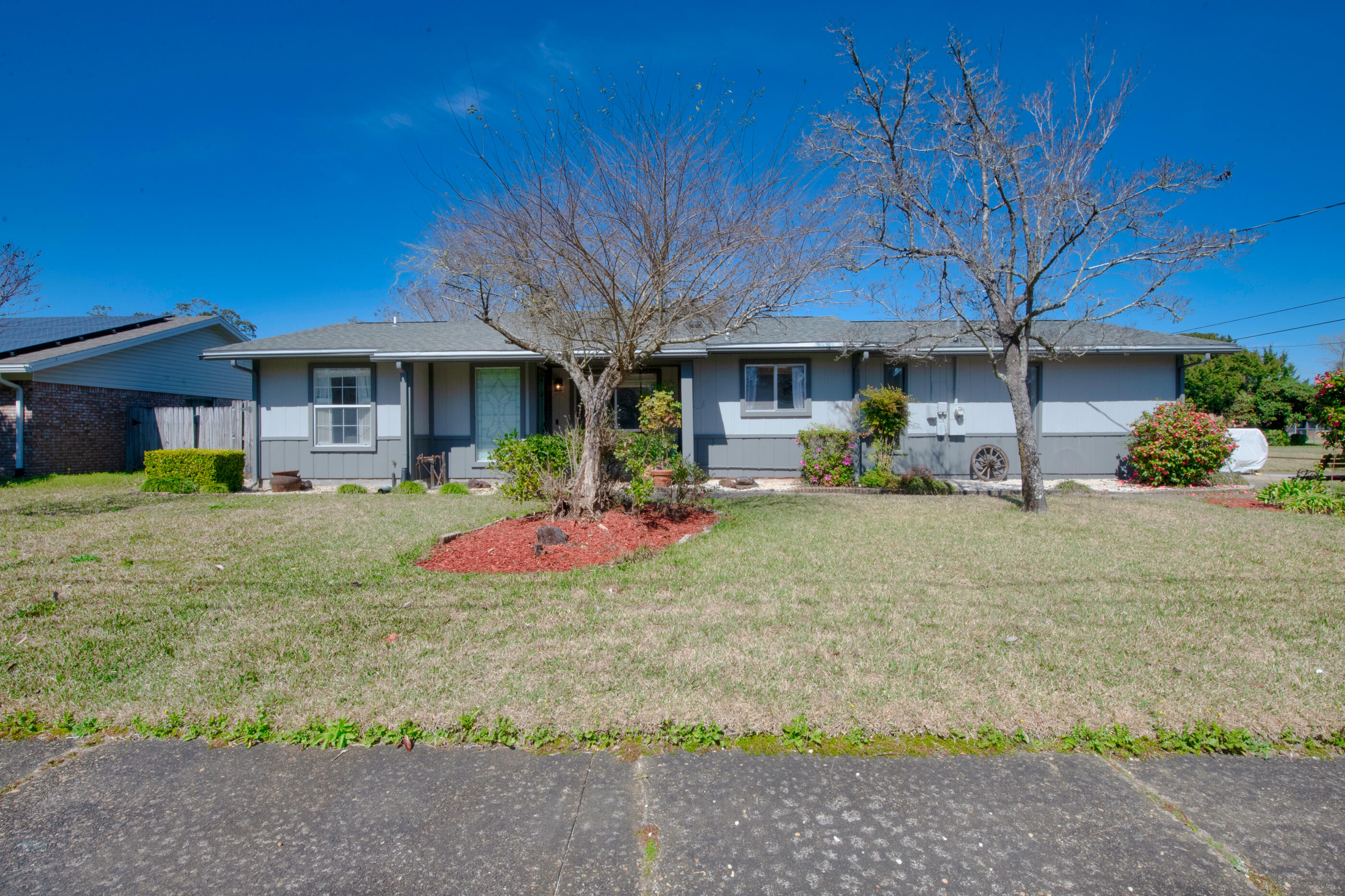 Beautifully renovated home in the heart of Fort Walton Beach! This home features a newer roof 2019, HVAC System 2021, water heater 2021, upgraded flooring, oven 2020, microwave, 2022, dishwasher 2022, updated plumbing 2021, upgraded paint (exterior and interior), updated bathrooms, light fixtures, and outlets! This home offers a living room, separate dining room, additional well sized den/bonus room perfect for entertaining guests. This home also offers a gorgeous backyard oasis, with a sitting pavilion area, covered back patio, fruit trees, shed, and more! Do not miss out on the opportunity to view this home! Schedule a showing today.