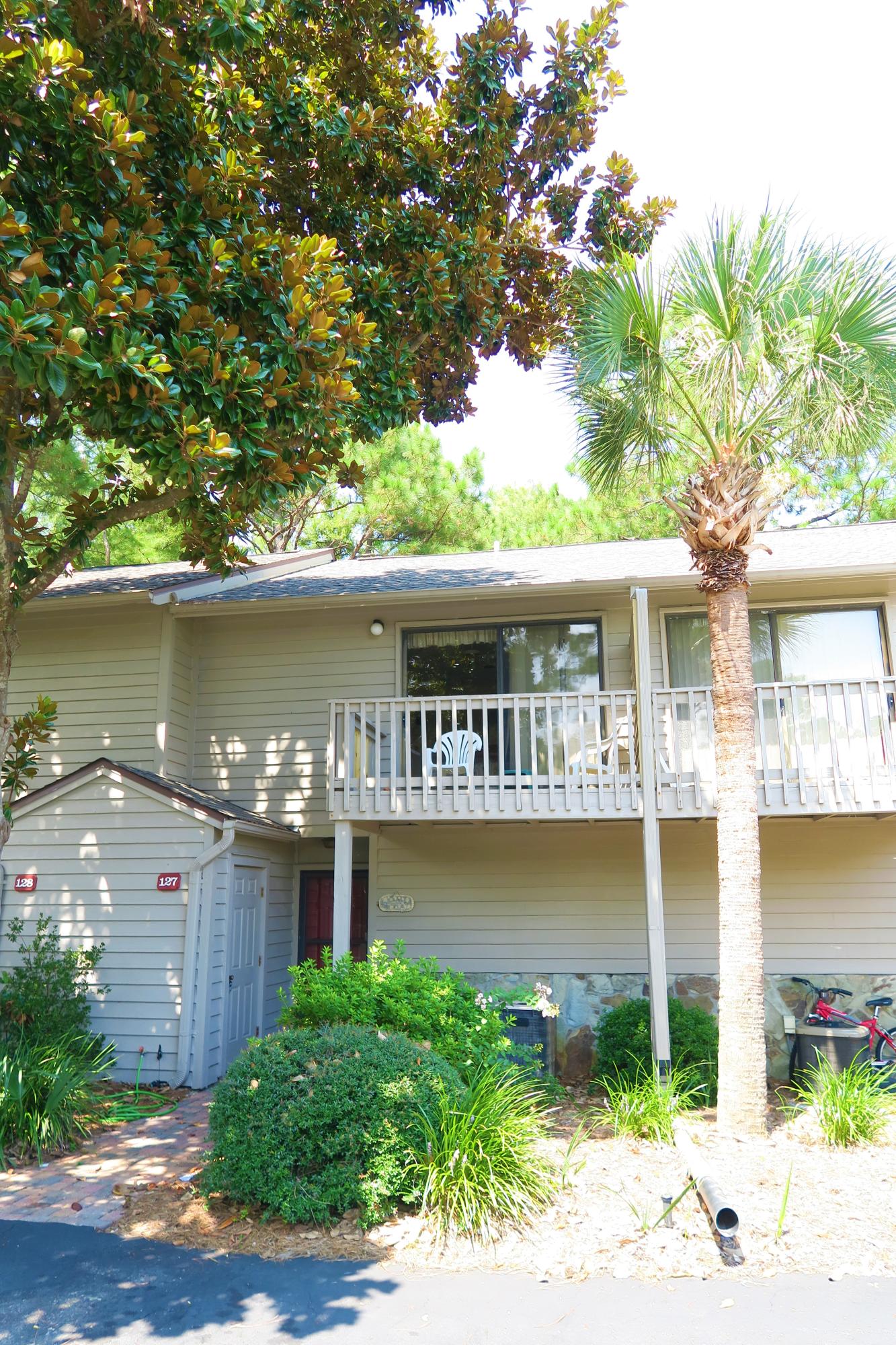 This 2 bedroom 1 and half bathroom townhouse is just a short walk to the beach and an investors dream. It has double screened in porches on back overlooking private neighborhood nature preserve, balcony on front off of master and open living space below. There is large closet in front for beach storage or bikes. The bedrooms both have large closets and private porches. Cassine Gardens has 2 tennis courts, 2 pools,nature trails and right across the street from public beach access. This unit is sold furnished so keep on renting or remodel and update to your preference. It is rare that a townhouse comes on the market this close to the beach with so much potential.