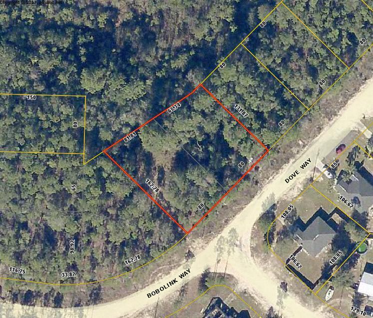 2 adjoining wooded lots just 600 feet off the paved road. There is gravel on the portion of Dove Way that fronts these 2 lots. Easy access to I-10 & Hwy 285 i Mossy Head. Utilities believed to be available are electricity and water (please verify availability). Although the roads in this area are county owned through its subdivision, Triple Lakes, the roads are not maintained by the county. Affordable homesite!!! Mobile Homes are allowed.