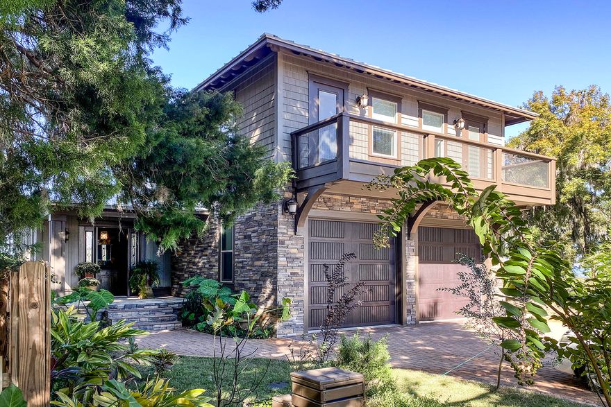 This custom 2 story bay front home built 2015, it sits on the beautiful Choctawhatchee Bay. The front of the home features a brick driveway a 2 car garage and covered entrance to the front door. A foyer directs you to the open beautiful living, dining, kitchen and the VIEW of the bay. The open living area features a half bath, wet bar, ice make, stone fireplace with stained pecky cypress walls, 10 foot ceiling with wooden beams and 12 foot pocket sliding glass doors. All of this is just the framework to the Beautiful Bay View. Get ready for the Kitchen....It is a dream a 48 inch Wolf propane stove with griddle and grill & double ovens. Above is a pot filler and stainless hood. Subzero double door freezer/ Refrigerator that features  an ice maker, with 4 pull out drawers. A 3 x 6 Wine Freg.