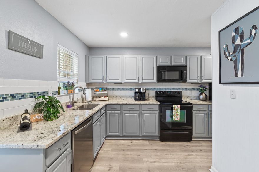 UNDER CONTRACT AND ACCEPTING BACKUP OFFERS
NEW ROOF BEFORE CLOSING. Welcome in to a gorgeous, fully furnished townhome. As you walk in you'll be impressed by the stylish kitchen featuring granite countertops and coastal backsplash. The bottom floor has a large pantry/owners closet, half bath, spacious living room with updated recessed lighting, and a bedroom and walk-in closet. Step out back for a private space to drink your morning coffee. Upstairs are two bedrooms, updated bathroom, and spacious laundry room. Beautiful LVP floors throughout make for easy cleaning. 

All furniture, appliances, linens, and fully stocked kitchen convey. Furnished by an interior designer to be the most desirable for guests or your own oasis. NO HOA.