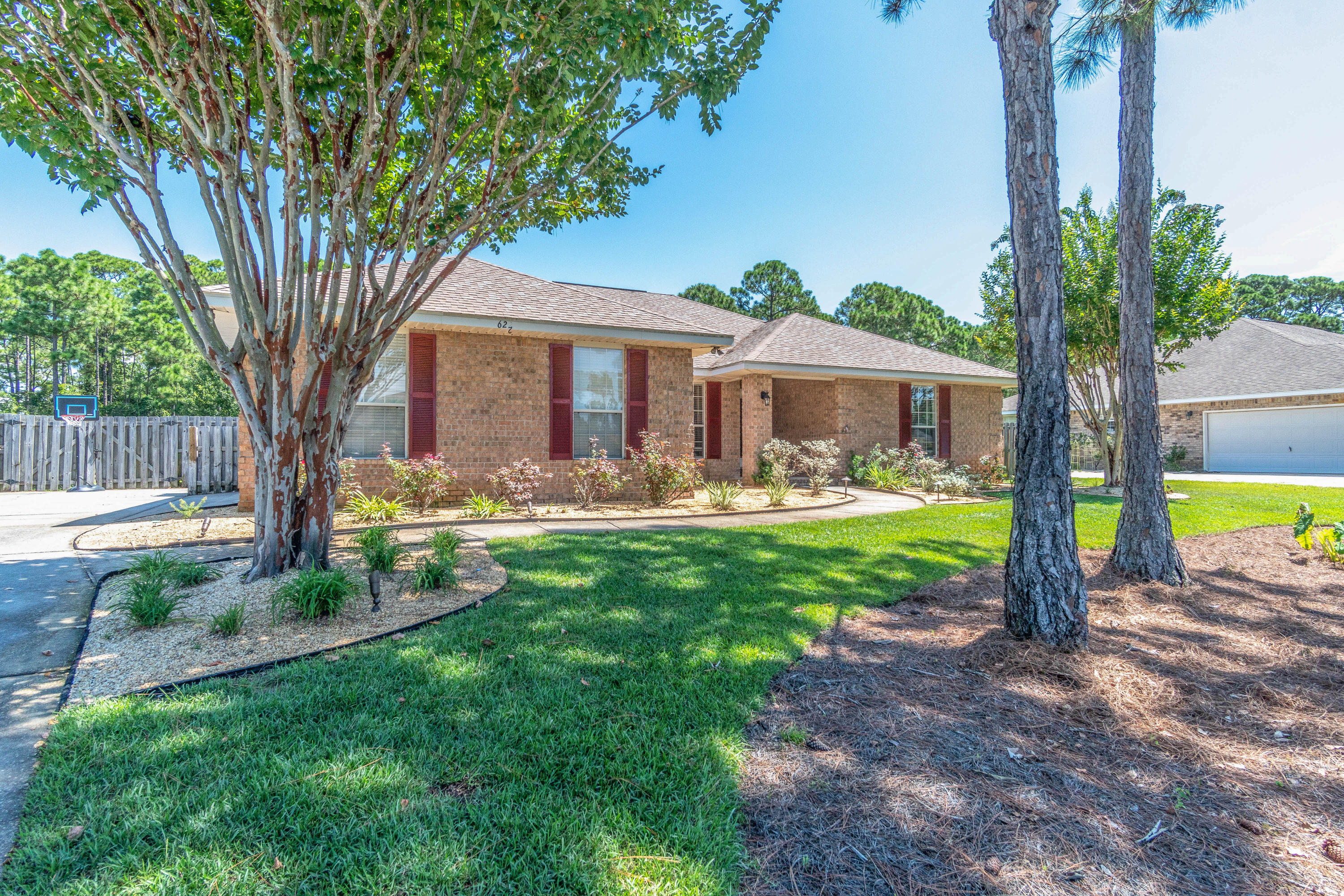 This beautiful home within Driftwood Estates is like no other you will find. Completely updated with today's most sought after finishes, the spacious kitchen has been outfitted with a Wolf Induction cooktop, double ovens, vent hood with custom wood overlay, wine fridge, farm house sink, custom cabinetry with soft-closures, and so much more. Wood designed tile floors have been installed throughout, and all bathrooms have updated custom cabinetry, new light fixtures, granite countertops, with special attention given to the spa-like master bathroom. Your family will enjoy privacy as this property is nearly half an acre and backs up to a natural preserve buffer. The huge back yard includes raised garden beds, lots of citrus trees, and a stunning lawn. This home is move in ready & a must see!