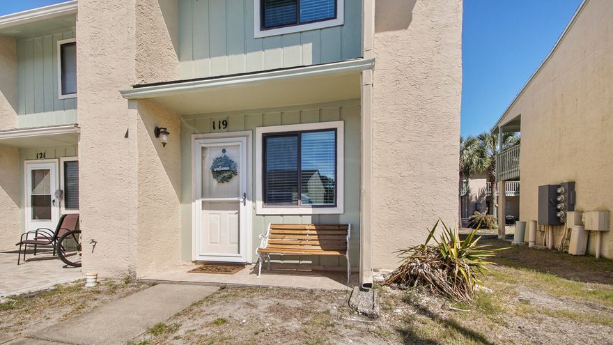 Great opportunity to own a this nice, fully furnished end unit townhome that allows short term rentals & comes with a golf cart! This one is rental ready or live in it full time! Downstairs boasts a spacious updated kitchen w/granite counter tops, dining room, living room & a half bathroom for guests. Upstairs features two large bedrooms each with their own full bathroom! Enjoy sitting on the covered back patio or swimming in one of the 11 swimming pools (5 heated)! The community also offers a 2 acre putt-putt golf course, shuffle board courts, 4 tennis courts & a club house w/pool directly on the beach. Life can't get better than this!