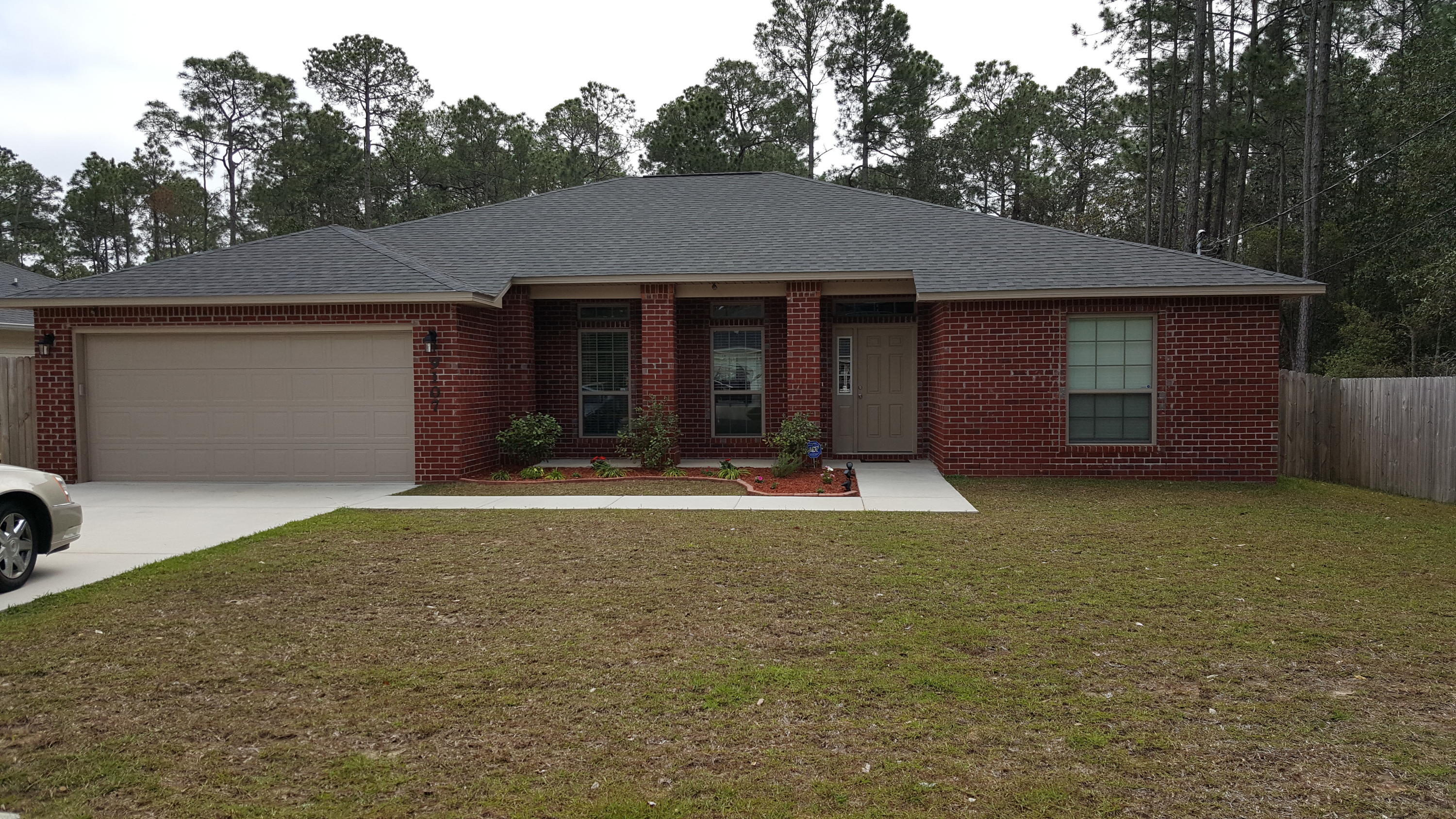 Looking for the perfect place to call home! Here you go! Immaculate 4 bedroom home with open floor plan & plenty of natural light close to Hurlburt Field & Beautiful Beaches on a half acre lot. Kitchen is complemented with granite counter tops, ample cabinet space, stainless steel appliances, kitchen island, breakfast bar, walk-in pantry & built in desk. Great Room has sliding doors leading out to rear patio. Master bedroom is very spacious with plenty of room for dressing area. Additional bedrooms are good size. Carpet in bedrooms with beautiful laminate flooring in all other rooms. Home offers keyless entry, Security System, & oversize driveway for additional parking. Dimensions and measurements are approximate, buyers to verify all information that is important to them.