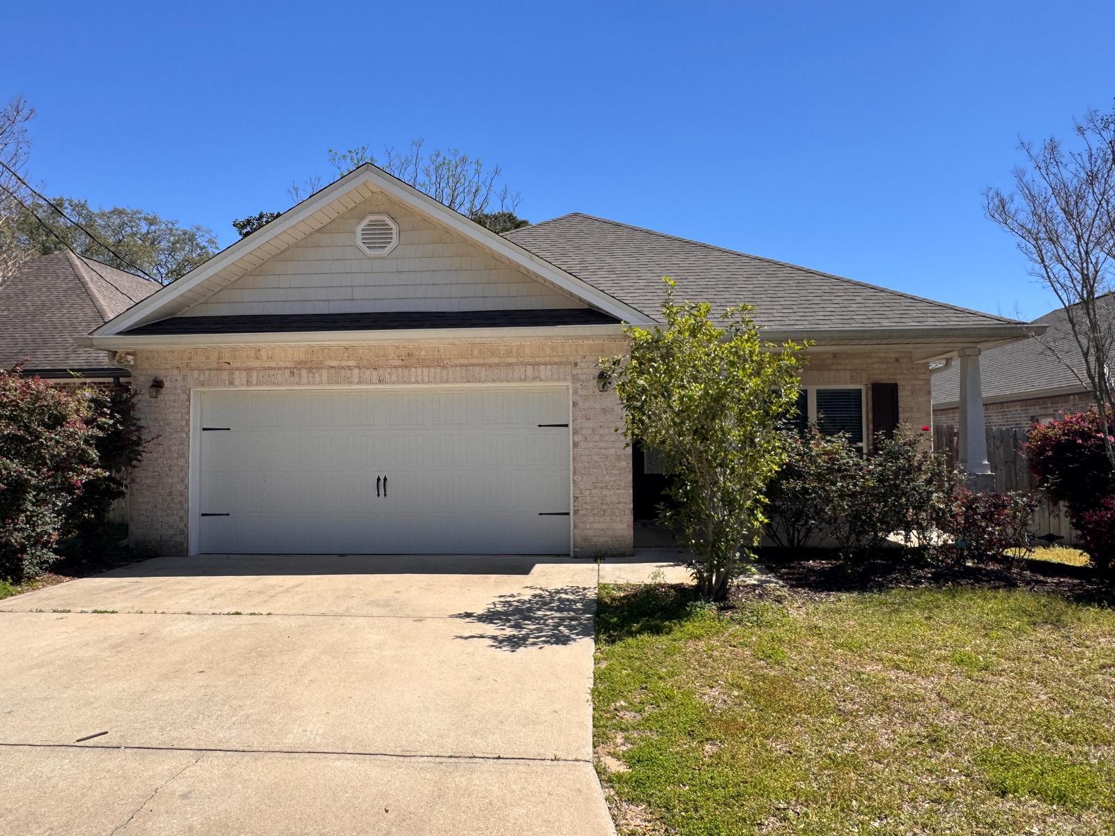 Discover this stunning, all-brick, 4-bedroom, 2-bath home built in 2018, located in the heart of Niceville. Perfectly situated for an easy commute to military bases, beautiful beaches, top-rated schools, shopping, and more, this home offers a highly desirable open and split floor plan, complete with modern upgrades and elegant finishes. Step inside to enjoy 9-11 foot ceilings, including tray ceilings in the living room and primary bedroom, complemented by crown molding, arched doorways, vinyl plank and tile flooring, and stylish updated light fixtures. The eat-in kitchen is a showstopper, featuring quartz countertops, custom soft-close shaker-style all-wood cabinets, sleek slate appliances, a spacious walk-in pantry, and a large island with a breakfast bar. For formal occasions, a separate dining area adds an extra touch of sophistication.
Double doors off the spacious living room lead to a covered back porch, perfect for relaxing or entertaining while overlooking the privacy-fenced backyard. The primary suite is truly impressive, with a massive bedroom, an expansive walk-in closet, and a luxurious en suite bathroom featuring a glass-door tiled walk-in shower and a double vanity. The additional three bedrooms are generously sized and share a beautifully designed full guest bathroom. A convenient laundry room leads to the attached 2-car garage.
Pets may be considered on a case-by-case basis with prior owner approval and a non-refundable pet fee. Smoking, including vaping, is not permitted on the property.
This gorgeous home won't last long. Schedule your showing today!