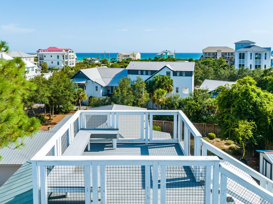 **OFFERING $30,000 CREDIT TO BUYER TO USE HOW THEY CHOOSE! - GULF VIEWS - ONE BLOCK TO BEACH ACCESS** 121 Hilltop Drive is a charming beach cottage where you'll enjoy views of the Gulf from the roof top deck with a great beach access just a 2-minute walk down the street at the end of Hilltop Drive across from Stinky's Fish Camp. This property offers excellent privacy on a large lot with mature landscaping, palm trees, citrus trees and a private heated pool with hot tub! The first-floor features 3 bedrooms, a full bath, kitchen, dining/living area, bunk/media room, laundry and garage. The second floor is a HUGE master suite with a balcony and stairs to the roof top deck. Home has new interior furnishings as of Spring 2024 and it is sold fully furnished! If you are looking for true Old Florida Beach Vibes with a great location, check this one out!