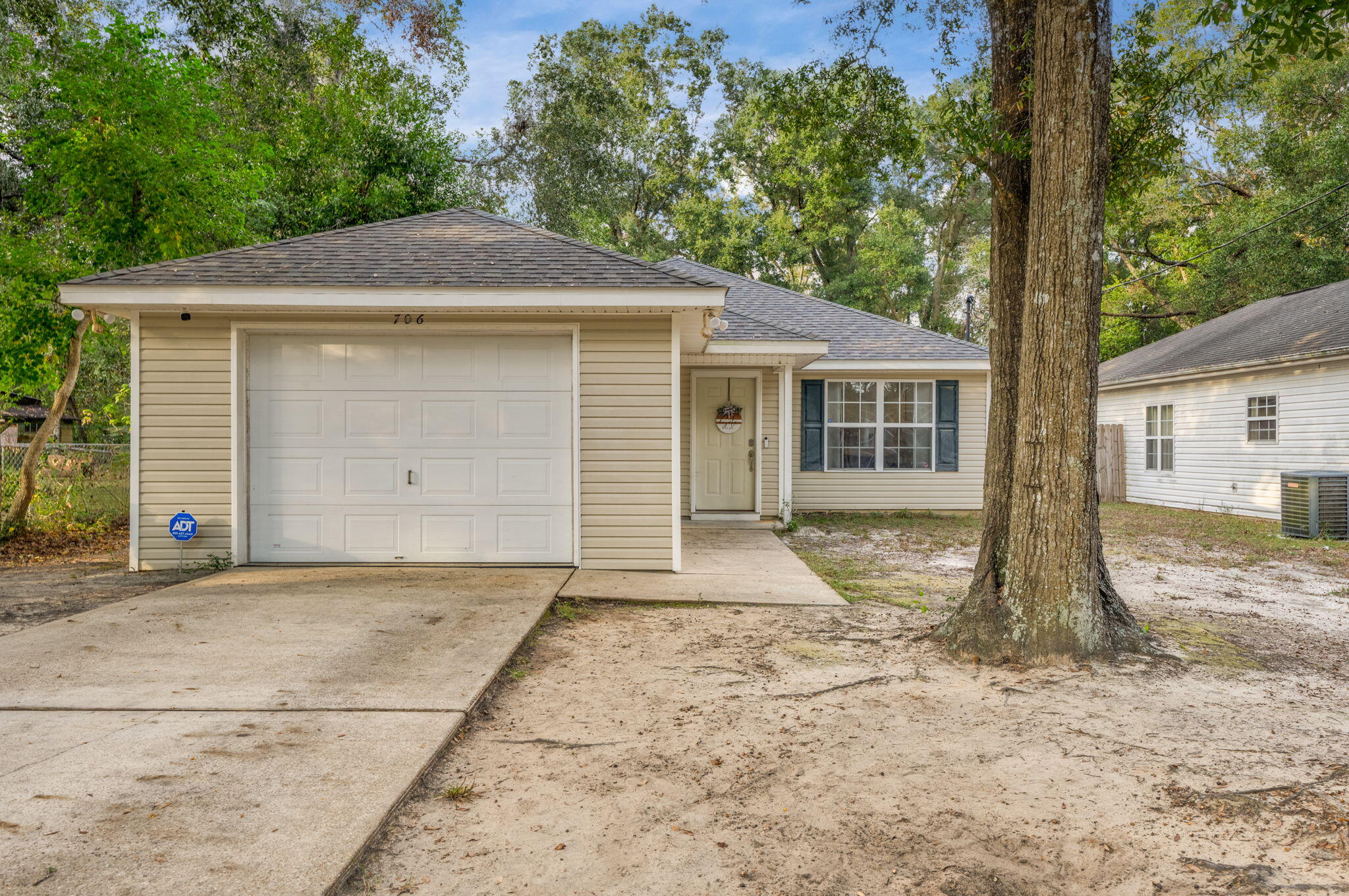 Adorable home located in the heart of Crestview! This home features a split floorplan and open living space with all the big ticket items replaced in recent years! Roof, water heater, fridge, and dishwasher were replaced in 2022. New flooring in the living area in 2023 and a new HVAC in 2024!