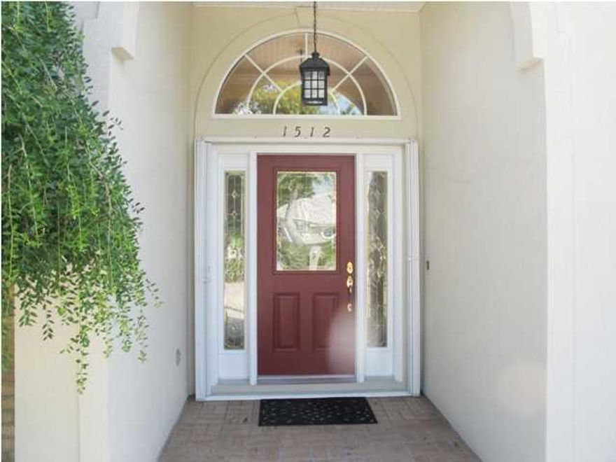 Here it is, another beautiful Custom built home in the exclusive Subdivision of Glenlake. As you drive up to this stately home, you'll see the circular driveway and side entry three car garage. Enter this brick home to a tiled Foyer, and bamboo flooring in the living room and formal dining room to the right. Home has an open plan kitchen, huge den with Gas fireplace, and breakfast area. There is tiled sun room that opens out to the spacious back yard backing up to the Golf Course.Split floor plan is designed with 2 bedrooms with shared bathroom one side, and bedroom/office and master bedroom on the other side. Master bedroom is the only room with carpeting, also a double treyed ceiling, sitting area, and recessed lighting, double vanity in master bathroom and walk-in closet. A must see.