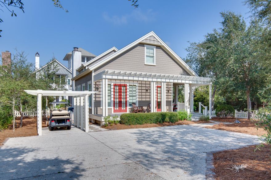 JUST REDUCED by $150K!!  A quintessential Florida Cottage, inside the gated community of Watersound Beach, on a premium corner lot with plenty of space to add a Carriage house and pool. The 2 large wraparound porches and a short distance to the most desirable beaches offers the perfect beach lifestyle. Large back porch overlooks a community boardwalk that takes you to the white sandy beaches of the Gulf of Mexico. The open floorplan offers 10' ceilings downstairs, 9' ceilings upstairs, with recessed lighting, hardwood floors, crown molding, exquisite millwork with 6' baseboards and custom shades/curtains throughout. The gourmet kitchen features newer KitchenAid appliances installed in 2018, granite countertops, upgraded cabinets, an oversized island and under cabinet lighting.