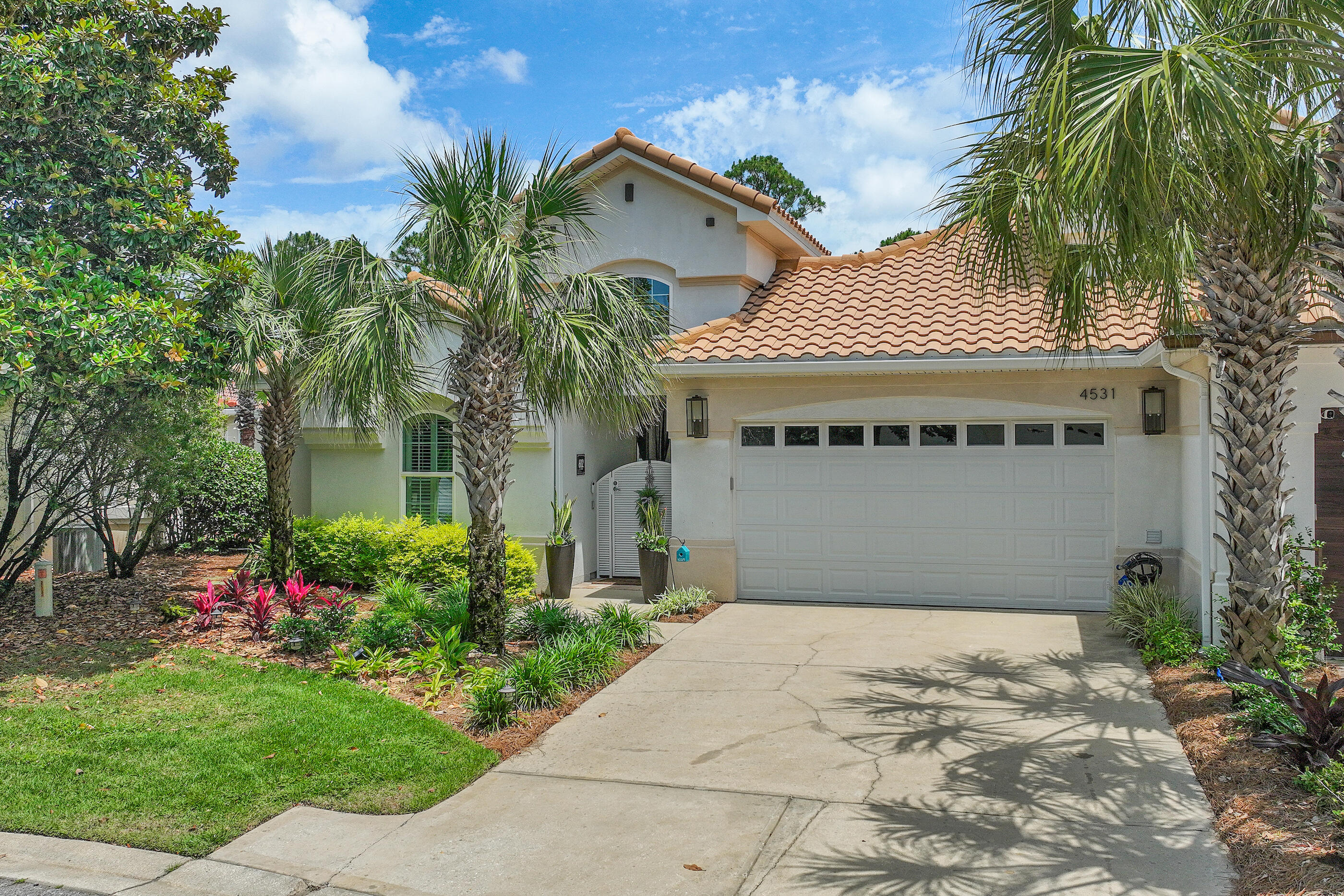 Step into a home that feels like a private resort--where indoor comfort meets outdoor luxury in one of the area's most popular gated golf communities. Centered around a serene courtyard with pool, this single-level residence offers a seamless blend of sophistication and ease. A separate guest casita with full kitchen and bath invites extended stays or multi-generational living, while the main home's chef's kitchen and open living spaces are designed for gathering and creating memories. Every detail is intentional, every space turnkey (sold furnished). From the carpeted 2-car garage to the custom outdoor kitchen, this is not just a home--it's a lifestyle you won't want to miss. Enjoy within the community- golf, tennis, pickleball, and bay recreation via the community's exclusive rear gate.