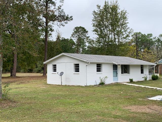 ***1.65 ACRES in the heart of Freeport, 3 miles from hwy 331 .Great little starter home UP GRADED WITH NEW FLOORS , BATHROOMS , KITCHEN , ALL NEW APPLIANCES .2 Bedrooms 1 Bath There is an extra bonus room for office or an additional bedroom . Only 10 minutes to the Beaches of South Walton and 30A. COME SEE, YOU WILL LOVE THIS LITTLE WHITE HOUSE.