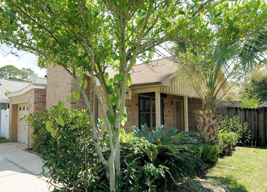 Super cute starter home or perfect investment! The home features granite counters with updated flooring throughout the house. Fresh paint has just been done to the entire home creating a beautiful light, bright house . The kitchen has a warm tile backsplash with granite counters and fresh white cabinets. The master bedroom has a large sunroom or extra den off it that leads to back yard. The master bath also has upgraded granite counters in it as well. The dining area also has sliding glass doors that lead to a large patio perfect for grilling and entertaining with friends and family. The laundry room has a washer / dryer combo set that will convey with the home that is only 2 years old. This quaint home is conveniently located to both bases making it perfect as your next family home