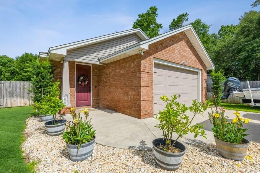 Welcome Home! This well maintained 2015 built home is located in beautiful Niceville, Florida! Minutes away from the beaches of the Emerald Coast. Convenient to all the local bases!This home features 3 beds, 2 full baths and 1,844 sq. ft. Completely open concept design. Great for entertaining! Luxury vinyl plank flooring and recess lighting throughout entire main living area. Great natural light!The kitchen boast solid wood cabinetry, 42'' uppers, soft close doors and drawers, stainless steel appliances, granite counter tops, tile backsplash, a kitchen island and large pantry.   A spacious master bedroom with a huge walk-in closet. Master bath features his & her's separate oversized vanities with marble tops and a large marble walk-in shower.