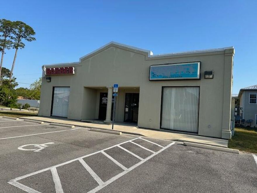 Santa Rosa Plaza - This is a commercial space for lease that can be office or retail.  The corner of Don Bishop and Highway 98.  Only two businesses in this building. There is plenty of parking!  Neighboring businesses are 98 Bar B Q, a Barber shop, laundry mat and a car wash.  This is a very busy area with lots of traffic.