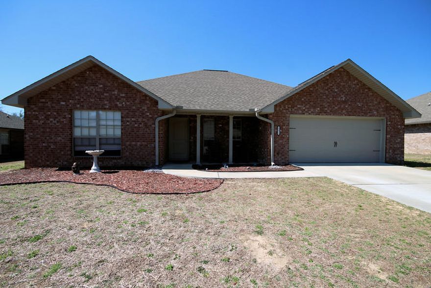 Great ALL BRICK - 2.5 yr old home in a Great Neighborhood with a Playground Area!! This 5 bedroom can be 4 plus Den/Office. Large level privacy fenced lot. Granite countertops in kitchen and both baths. Appliances include Refrig. Tile flooring in wet areas. Laminate flooring in Dining room, Breakfast Nook and Foyer. Large Master with walk-in closet and WALK IN SHOWER in Bath along with large Tub. This home is well cared for and large enough for many friends to entertain with the open kitchen floorplan. Formal Dining room can be formal living room in addition to Large 22x16 Great room. Please note this is not in city-meaning only County taxes = savings to you in mo. paymts!!