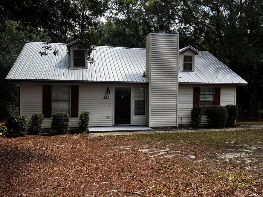 For Rent | 358 John King Road, South Crestview, FL 32539Welcome to this beautifully updated 3-bedroom, 2-bathroom home located in South Crestview, offering a peaceful setting with unbeatable convenience. Ideally positioned for easy access to military bases, local schools, shopping centers, and restaurants, this home is perfect for those looking to stay connected.The interior has been freshly painted and features stylish new light fixtures that brighten every space. The spacious living room offers beautiful hardwood flooring, a cozy fireplace, and a ceiling fan for added comfort. The kitchen is fully equipped with newer stainless steel appliances, ample cabinetry, a mosaic tile backsplash, and tile flooring for easy maintenance. The primary bedroom features its own private bathroom, creating a relaxing retreat. Two additional guest bedrooms share a full bathroom, offering comfort and functionality for family or guests.

Step outside to enjoy the expansive fenced backyardperfect for entertaining, gardening, or letting pets play freely. A large deck provides plenty of room for outdoor dining or lounging, and an outdoor building adds valuable storage or workshop space. Additional upgrades include a newer air conditioning system and a durable metal roof.

Pets may be considered on a case-by-case basis with prior owner approval and a non-refundable pet fee. Please note that this is a smoke-free and vape-free property.

Don't miss the opportunity to live in this updated, move-in ready home in a prime South Crestview location. Contact us today to schedule a showing!
