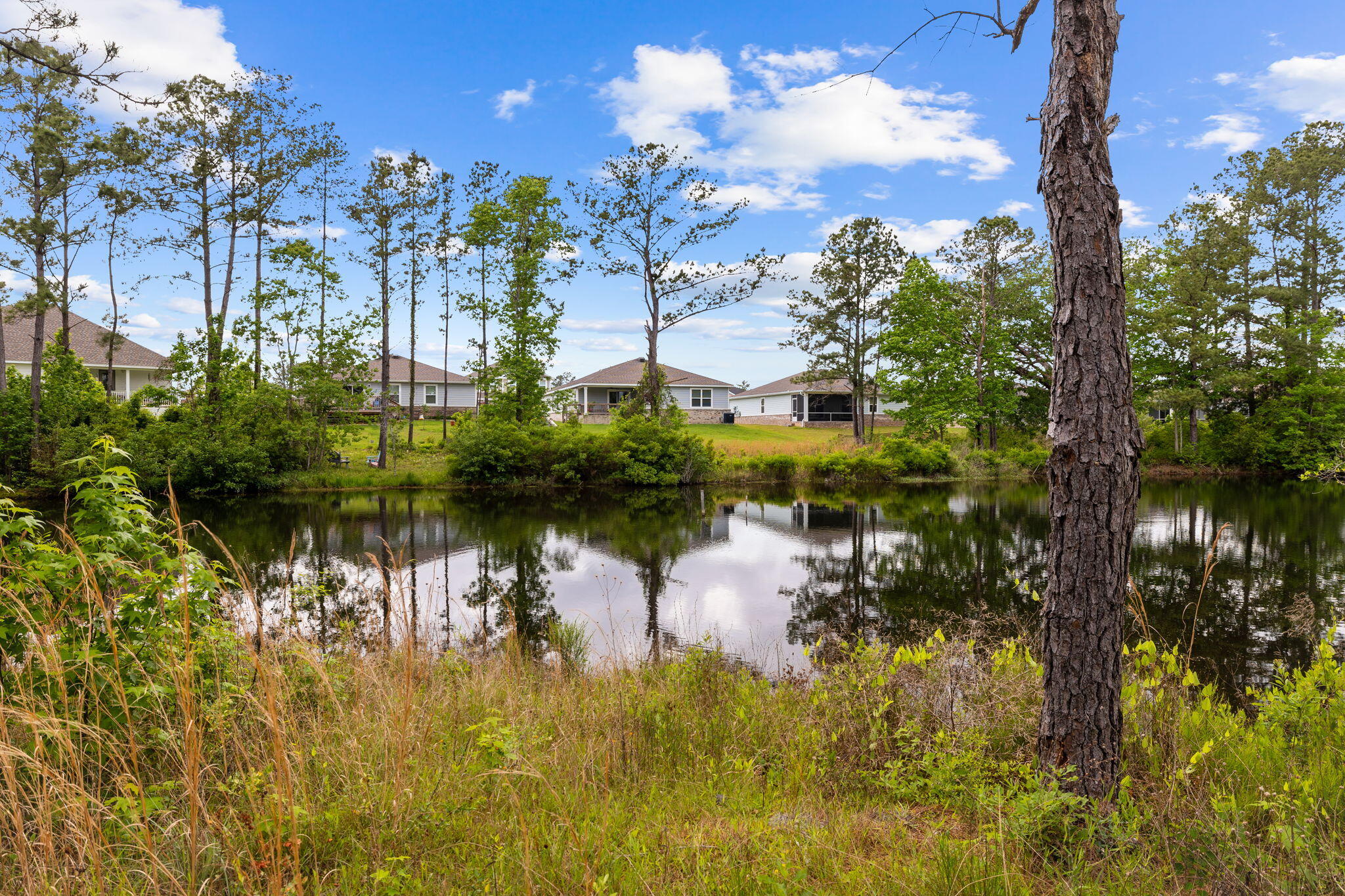 Welcome to Lagrange Landing, a charming enclave nestled in the heart of Freeport. This exceptional lot offers an unparalleled opportunity to create your dream home within a private community boasting 101 homesites. Positioned adjacent to the community pool and overlooking a tranquil pond, this lot promises serene views and easy access to recreational amenities. Centrally located, Lagrange Landing provides seamless convenient access to restaurants, shopping, and much more. Whether you're craving a day at the Beaches of South Walton, only a 10-minute drive away, or yearning to explore the historic charm of DeFuniak Springs, a mere 10 minutes in the opposite direction, this location offers the best of both worlds.