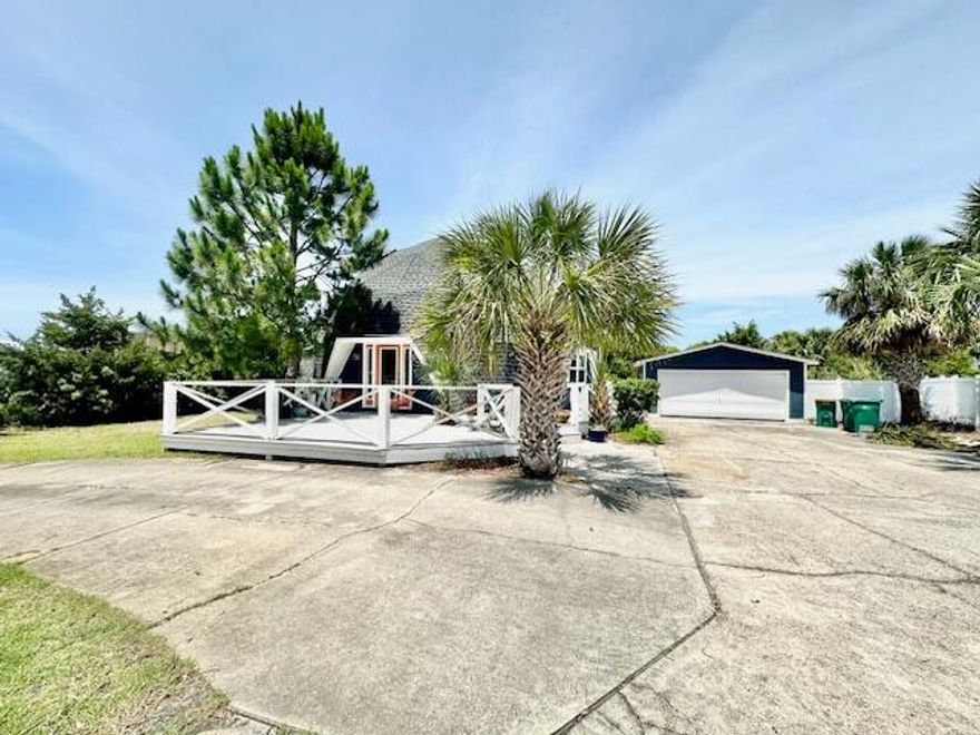 Avail: 7/30. Security Deposit = $4K, can be broken up in 2 monthly installments, if qualified. Pets allowed upon Owner's approval & w/ a pet fee. This beautifully remodeled 3 bedroom, 2 bathroom, 2 story house located on the desirable Okaloosa Island! This unique dome-shaped design features cathedral ceilings & skylights, creating a bright & airy atmosphere throughout the home. The open floor plan includes stainless steel appliances, pot filler, tiled backsplash, quartz countertops & a center island in the kitchen, perfect for entertaining. The master suite upstairs is loft-styled w/ a spiral staircase, while the 2 bedrooms downstairs share a jack-n-jill bathroom. Enjoy the privacy of the huge fenced backyard, detached 2 car garage & ample parking space. Relax on the open front deck w/ Trex flooring or the side patio w/ pavers. This home also boasts an inside utility room, recessed lighting, LVP flooring downstairs, bamboo flooring upstairs, lawn pump & sprinkler system plus a shed for extra storage. Nice cul-de-sac location for little through traffic. Don't miss out on making this gem your new home, welcome to Paradise!