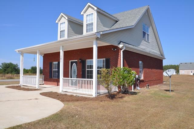 This charming, recently updated home is ready for you! Home is located in a great subdivision and has a large lot. In the kitchen you will find dark granite countertops, cherry cabinetry, backsplash, and stainless steel appliances. The first two bedrooms are located on the first floor, as well as one full bathroom. The master bedroom and en-suite offers privacy, as they are both located on the second floor. Schools, beaches, and shopping are just a short drive away too! Any sheds, outbuildings, and lawn pumps are being sold in ''as is'' condition and no value will be added.