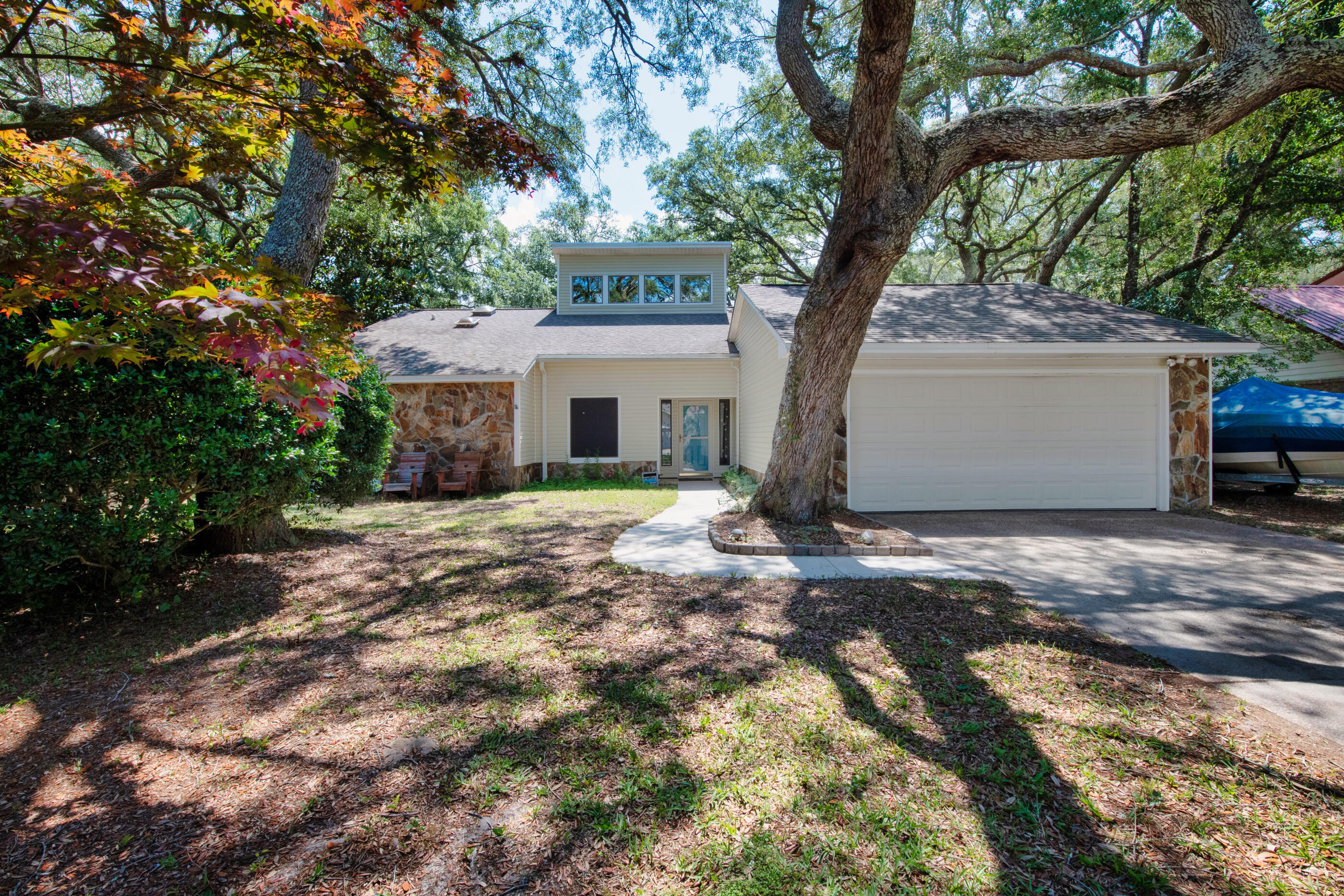 Become a resident of the coveted Bluewater Bay community with this meticulously maintained home nestled on a spacious 1/3 acre lot adorned by majestic oak trees. Enjoy the serenity of the fully fenced large backyard, offering privacy and ample space for outdoor activities. The air-conditioned Florida room provides versatility, serving as an ideal spot for entertaining or as a tranquil home office. Infuse your unique style, with plenty of room for personalization. The schools in Niceville are some of the top rated in the area. With recent enhancements including repainted dining room and kitchen cabinets, this home is ready to embrace its new owners and their cherished memories. HVAC 2018, PEX Plumbing 2016, & Water Heater 2021. NEW ROOF prior to closing! Assumable VA loan; 2.75% rate.