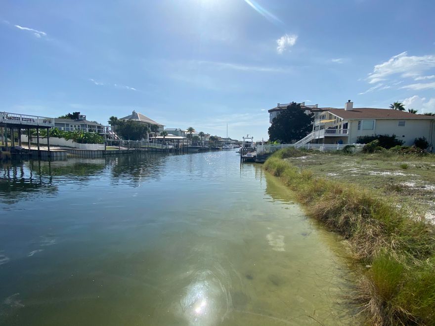 Don't miss your chance on this hot commodity! At this time there are no other lots currently available on Holiday Isle and 7 have been sold in the last 3 months! A boaters dream, this lot sits on a deep water canal providing quick, easy access to the Destin Harbor, Crab Island, and the Gulf of Mexico. Nestled a enjoyable stroll, quick bike ride, or fast golf cart ride from a private community beach access, you have easy access for enjoying our beautiful beaches. Located in the heart of Destin, you are minutes away from world famous restaurants, shopping, and play. Come find out why Coastal Living named the Destin Harbor in the ten best harbors in America! Everything you could want is at your fingertips, and now you can build your dream waterfront home!