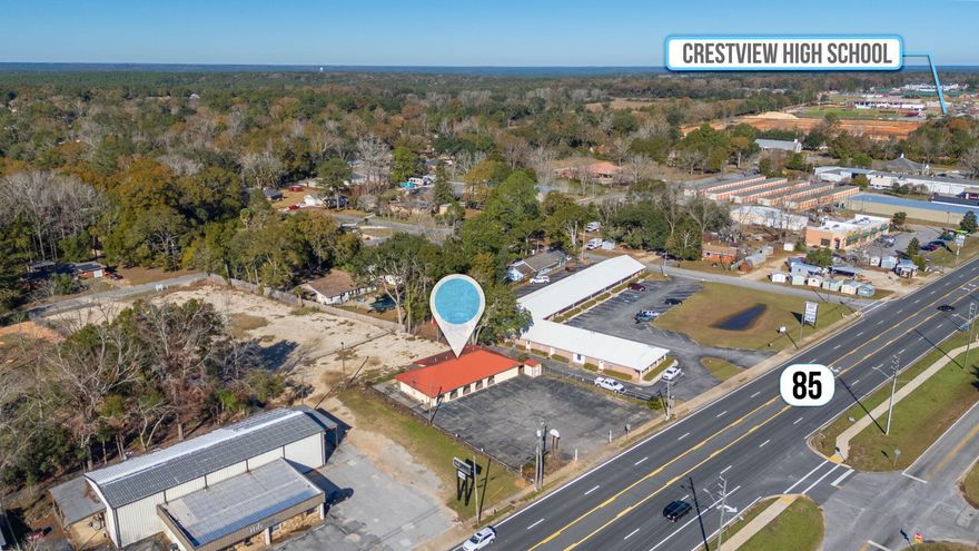 BACK ON MARKET, no fault of sellers!  This property is accross the street from the proposed site for Walmart.  Spacious commercial area with versatile usage options. Suitable for professional offices, retail, and more. Can be utilized as a single space or divided into three separate areas.