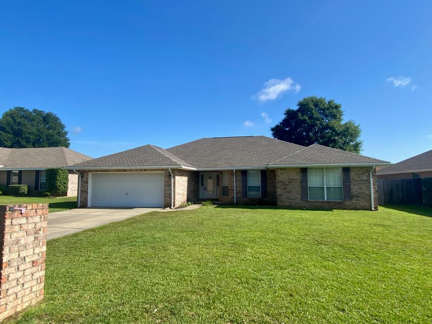 BRAND NEW ROOF July 2021! This 3 bedroom, 2 bath home has OFFICE with French doors and separate single door entrance (Currently used as 4th bedroom). Large open living area for entertaining, the kitchen is open with tons of counter space including a kitchen island from food prep. The bedrooms are all spacious. Located in South Crestview. No HOA dues! Large fenced backyard with no slope! This one is ready for you!