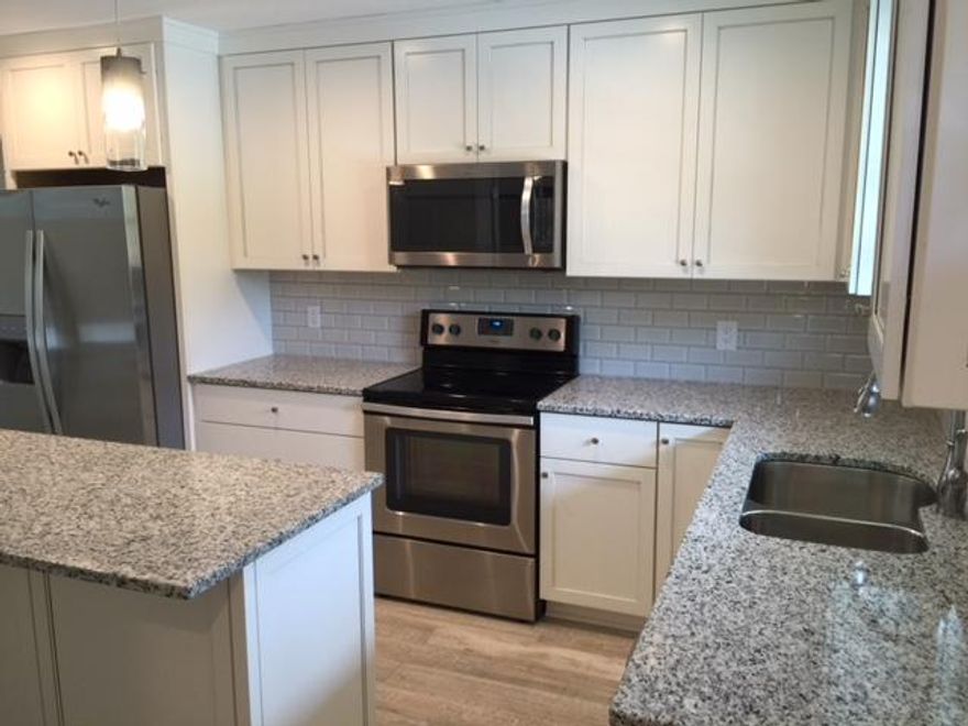 Renovated townhome in great location.  Just steps to the beautiful white sand beach. New electrical, plumbing and HVAC. Added 2nd full bath. One of the only units with 2 full baths in the complex. Unit is a end unit and a must see to appreciate. Low HOA dues. All dimensions and information to be verified by buyer.