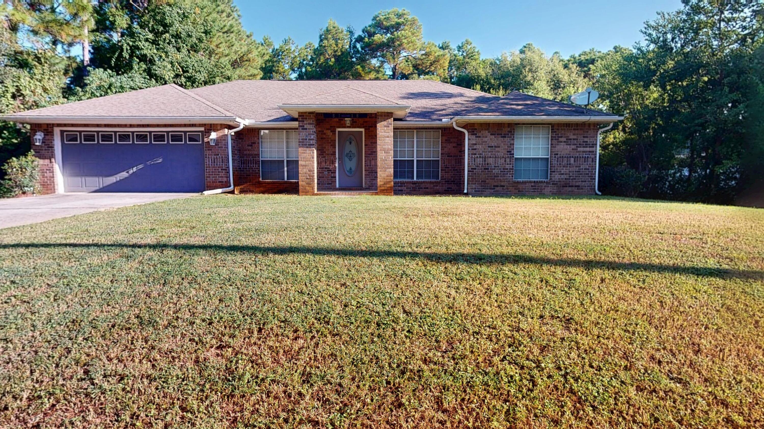 Come see your next home or investment property in Navarre that is a four bedroom 2 full bath home with a fireplace and vaulted ceilings. The kitchen is a wonderful place for cooking and has numerous cabinetry for all your dining needs. The kitchen has a breakfast bar that opens up to a wonderful breakfast nook and the home also has a dining room. The Main Bedroom has a large walk in closet with an amazing master bath that includes double vanities, a large garden tub and separate shower. There is a large back yard that has plenty of room to add a pool and a small patio that is accessible from the Main Bedroom and the Great Room.