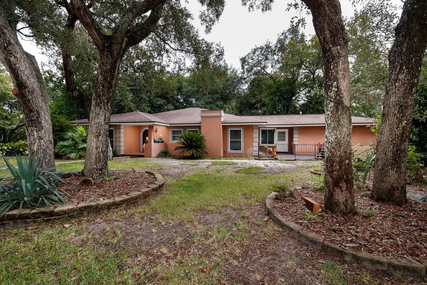 Custom home in the highly sought after community of Elliot Point! Whether you want to walk to the Bay (1 block away), visit local parks/playgrounds, or take in a quick shopping trip--this property is located in the heart of it all! This home was completely rebuilt in 2004 and brought back to life as a custom Mediterranean style home. Be sure to note the ''Home Feature List'', which includes 5 pages of details/upgrades to the home. Property features 3 well laid out bedrooms, 2.5 baths, dining area, breakfast area, fireplace, butler's pantry, master bathroom oasis, and a gourmet kitchen. Exterior has 2 driveways, gorgeous oak trees, and producing clementine trees. There is a bathroom accessed from the rear patio area, designed so that future pool guests can easily access.