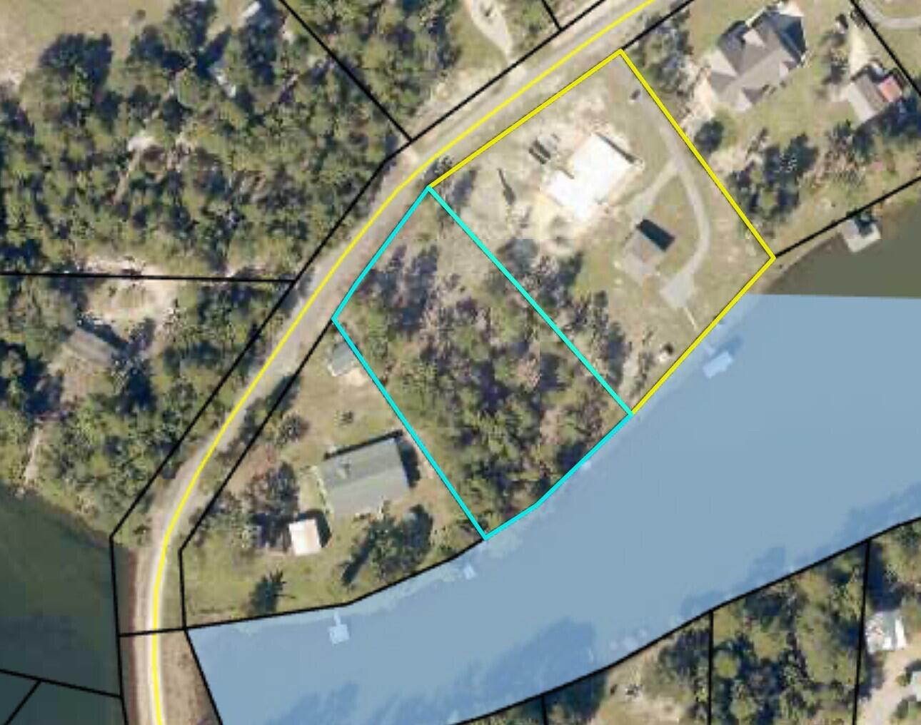 Beautiful lakefront property with mature trees. Entered for comp purposes only.