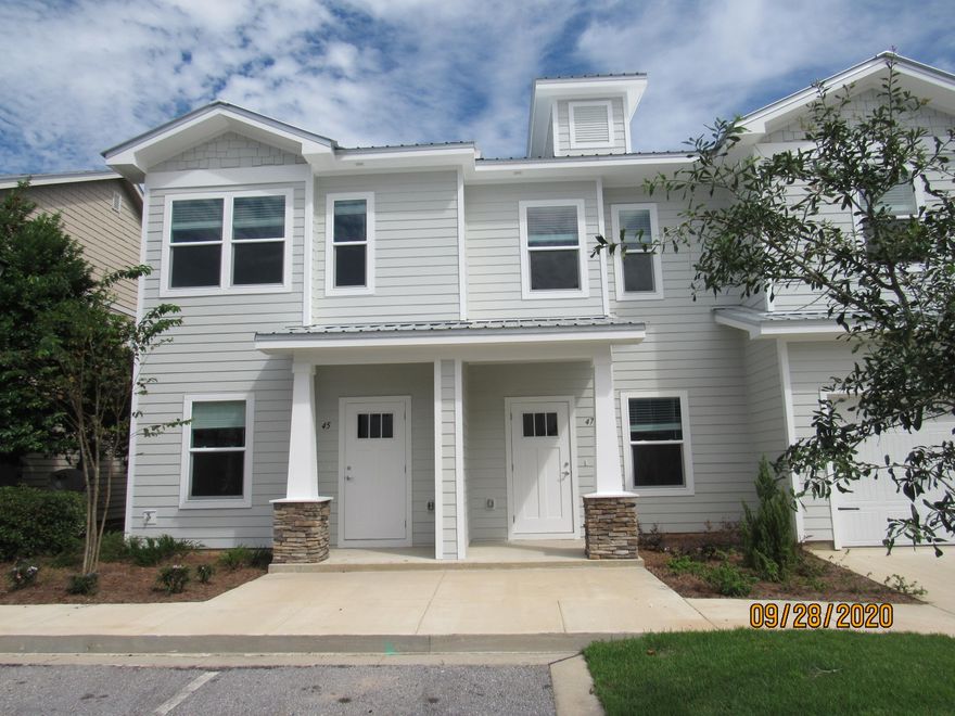 This beautifully upgraded end-unit townhome, built in 2020, offers 3 bedrooms and 2.5 baths, perfect for modern living. Located directly across from an elementary school and just down the road from a Publix shopping center, it provides a convenient lifestyle with a short, easy commute to the sugar sand beaches and emerald waters of 30A/SOWAL.
Inside, neutral paint and a carpet-free interior for a clean, contemporary feel. The open floor plan on the first level includes a spacious living room with a cozy nook, an eat-in kitchen with a breakfast bar, stunning countertops, ample cabinet space, and stainless steel appliances, including a flat cooktop stove. The kitchen is beautifully accented with a stylish backsplash. . A half guest bath with a pedestal sink and a screened-in back porch complete the first floor.
Upstairs, the primary bedroom boasts a walk-in closet and an en suite bathroom. Two additional guest rooms share a full guest bath and are conveniently located near the laundry area, which includes washer and dryer. The home offers plenty of storage throughout.
Community amenities include a pool, with pool care, lawn care, and garbage services included in the rent. Pets are considered on a case-by-case basis with prior owner approval and a non-refundable pet fee. Please note that smoking, including vaping, is not allowed.