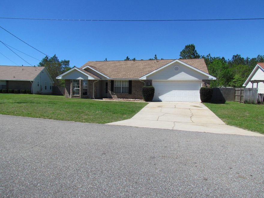 Ideal location! This lovingly maintained 3/2 family home is located on the south side of I-10 with easy commute to military bases, shopping & the sugar white beaches of the Emerald Coast. Open floor plan includes kitchen with breakfast bar and appliances, spacious master suite, 2 roomy guest bedrooms and a large covered back patio to enjoy the Florida life style. Back yard is fenced for added enjoyment. Also an extra yard building for all the lawn equipment. New roof in 2017, newer A/C installed, newer kitchen appliances. Move-in ready!!