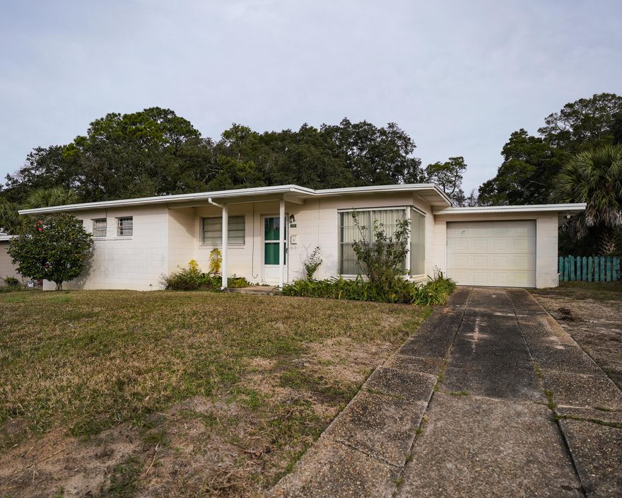 LOCATION! LOCATION! Centrally located and in close proximity to all things Fort Walton!  (Zoned MX-1, mixed use) so bring your creativity and create your dreams right here in this adorable cottage on this oversized lot! Additional 524 square feet of non heat/cooled  but attached space expands the possibilities. Just a 3-4 minute drive to downtown Fort Walton and minutes to the beach! Short walk to Bud & Dorie Day Patriots' Trail and Ferry Park (walking trail, disc golf, basketball court, fitness area, nature and a painted turtle filled stream!)