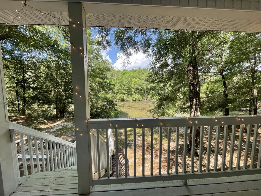 Come settle down 3 bedroom home, sitting on 5+/- Acres short distance from  town with a pond and big hardwoods! County setting in town!  This family ready home has so much to offer, like relaxing  outside on the porch, taking in that amazing and peaceful view of the large pond. Get that  country feel while still living in the heart of town! Short distance to shopping, local schools and beaches!