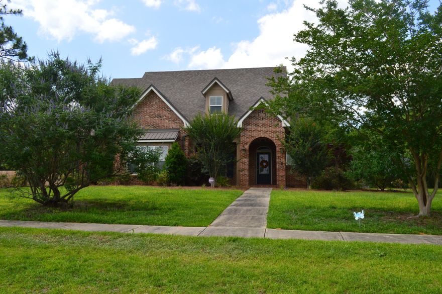 Wonderful 4 bedroom and 2.5 bath Randy Wise home in the sought after MIll Creek subdivision. Home is a Gulf Power Certified Earth Cents Home ! Beautiful kitchen with loads of cabinets and counter-tops overlooks the large family/living room, making sure the cook is never excluded. Home features beautiful wood floors throughout the down stairs. Spacious master bedroom is downstairs as well and features the same beautiful hardwood floors and a great sitting area. Master bath is spacious and features dual vanity and garden tub with a separate shower as well as a large pass-through closet which connects to the laundry room for convenience. Additional bedrooms are ample sized and all on the second floor. All of this on a 1/2 acre + lot with lots of green space for privacy.