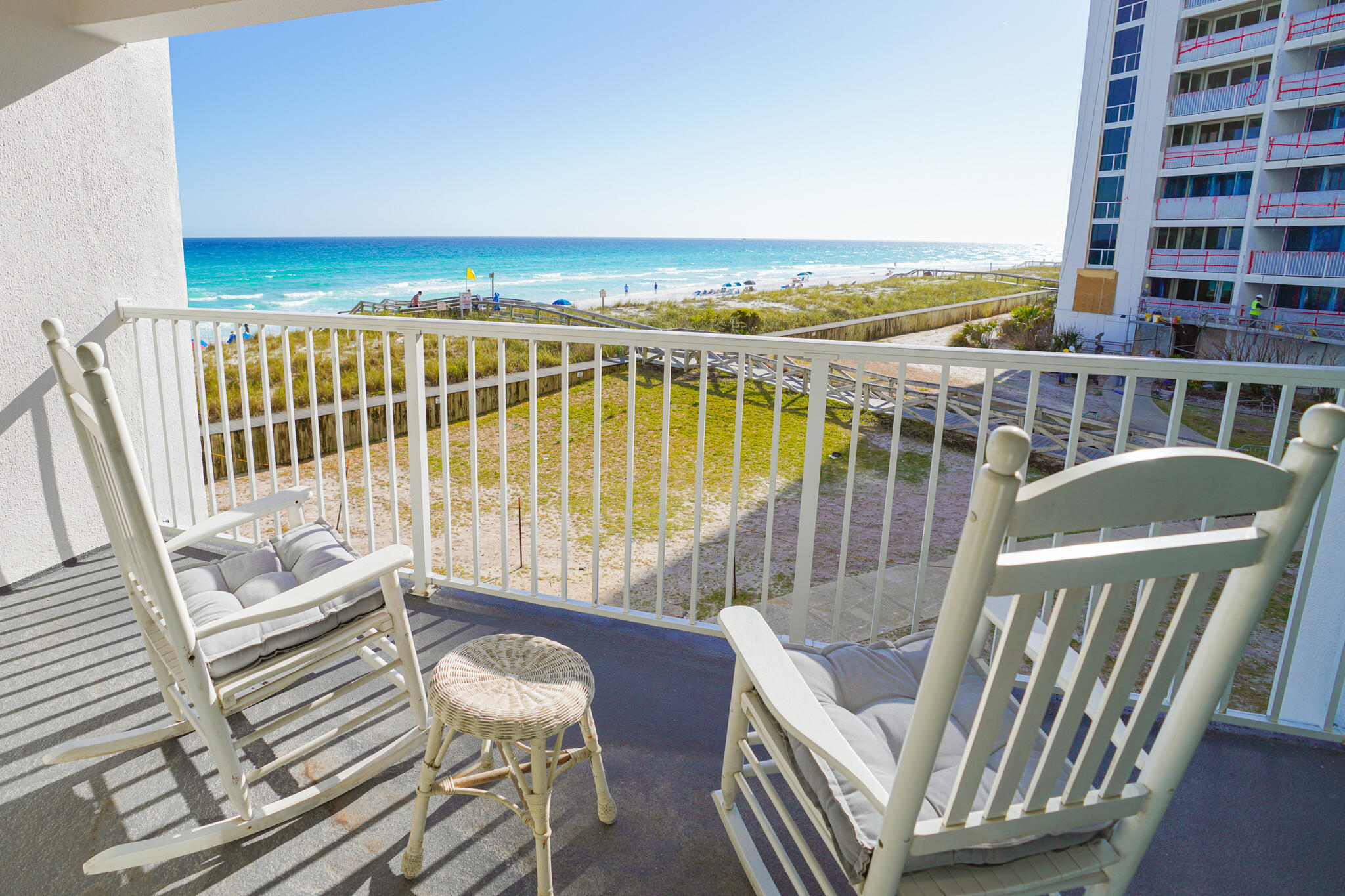 Motivated Seller. Gulf Front Turn Key well appointed 2BR in popular Shoreline Towers. Spectacular views from the third floor open balcony. This lovely unit is being sold completely furnished and Rental Ready! Upgrades include new AC, furniture, appliances, bathrooms, 3 remote control adjustable beds, TV's, linens, hurricane windows and sliding glass doors . Perfect for a permanent residence or second home on the beach. Great rental potential, too! Amenities include, 24/7 security, owners lounge and clubhouse, fabulous fitness room, boat or RV parking, tennis, sauna and heated pool.