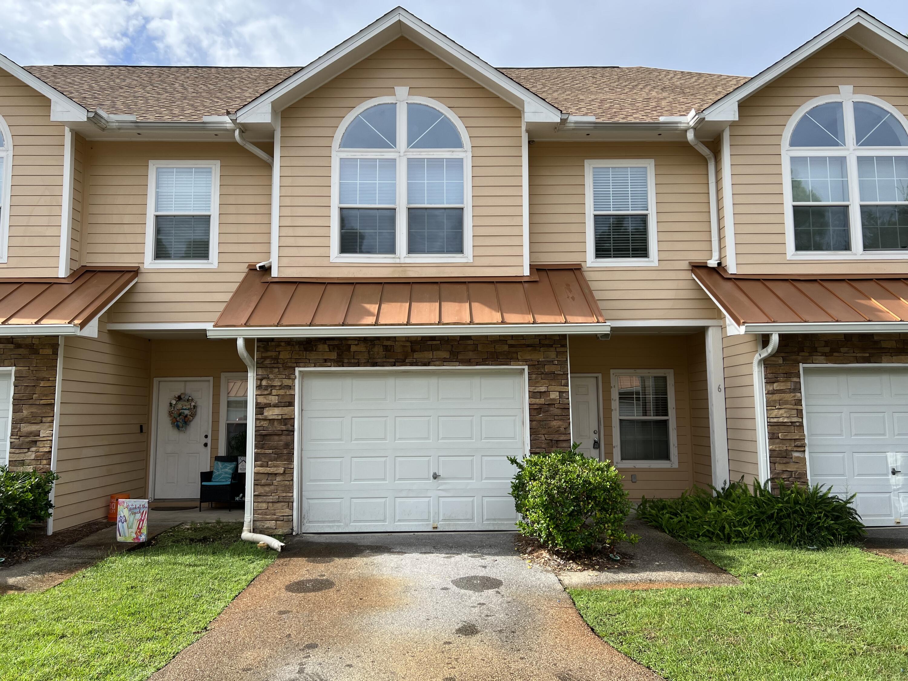 Beautiful 3 bed/2 1/2 bath! Open living areas on the first floor and spacious split bedroom plan on the 2nd floor plus a garage. The large master bedroom has a large walk in closet and en suite bath. Outdoor living space and private community pool. The location is minutes away from everything - shopping, dining, movie theater, Publix grocery store, Sacred Heart Hospital and only 10 minutes to the beaches on 30A! This property is being sold AS IS.
