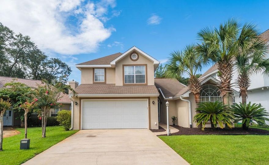 A great value - PRICED BELOW recent appraisal! You'll appreciate this well-kept, quiet neighborhood tucked in between Hurlburt Field and Eglin AFB. This home boasts 2 living areas and a loft space, high ceilings and architectural details.  The eat in kitchen has plenty of cabinet/counter space.  The dining area is just off the living room with gas fireplace and wired surround sound.  Enjoy your wine or coffee in the Florida room.  The downstairs master bedroom/bath features a walk in closet, tray ceilings, double vanities, cultured marble and a garden tub.  Downstairs there's also a guest bath and laundry room with washer/dryer that conveys.  Outside notice the patio, fresh exterior paint and gutters.  There's a termite bond in place and a home warranty conveys.   ACT FAST!  CALL TODAY!!